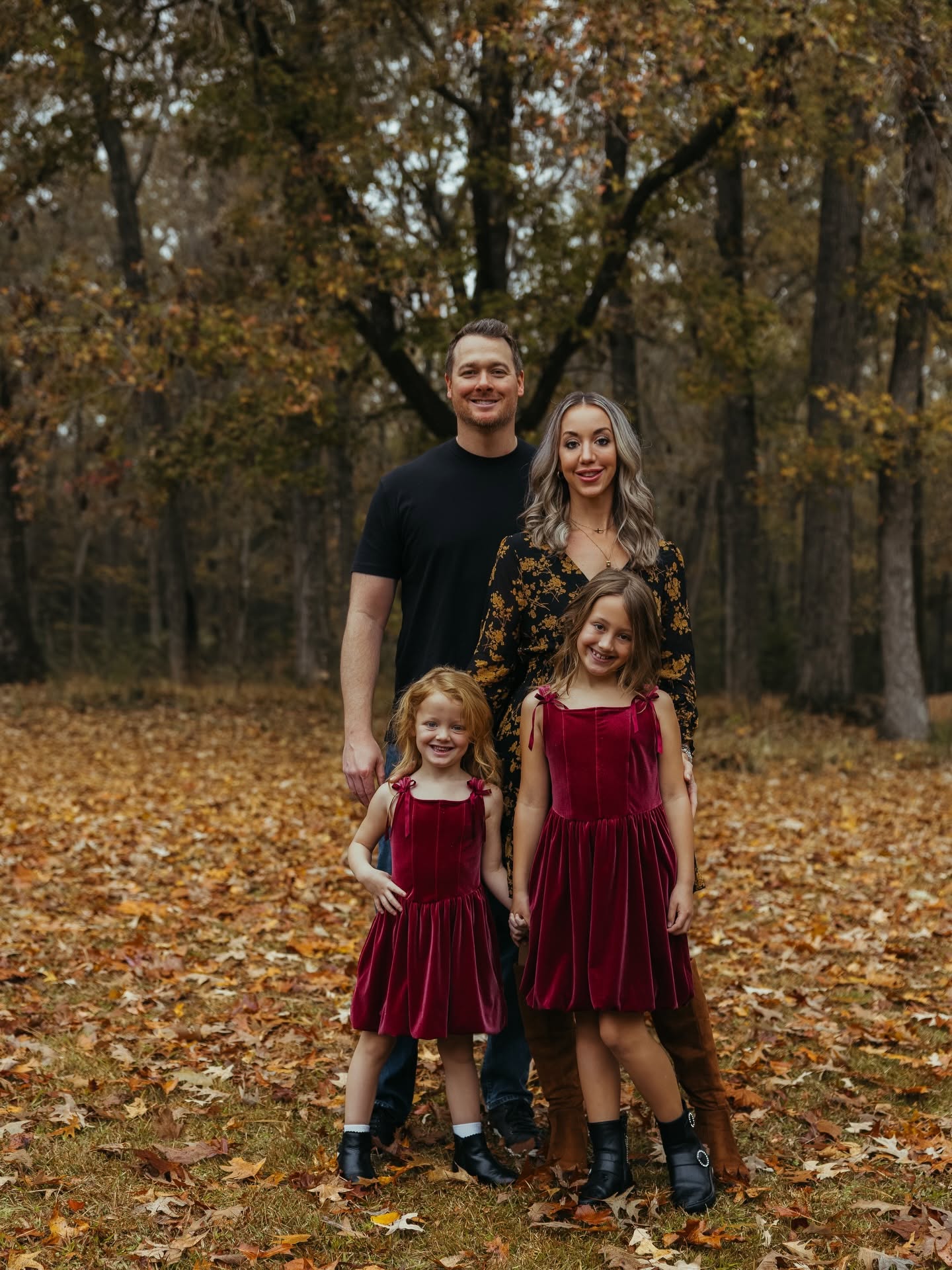 Erin with her family outdoors in autumn golden hour light